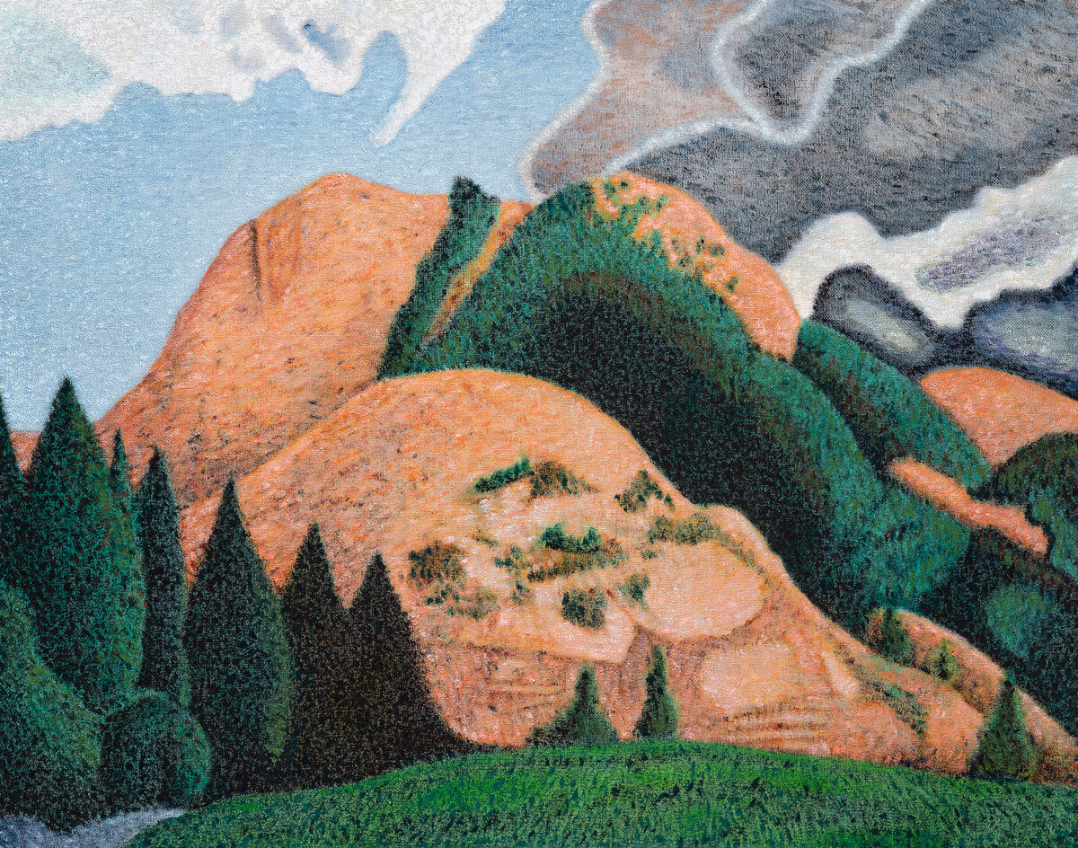 A stylized landscape depicting rolling mountains in warm terracotta and orange tones contrasted with deep green forested slopes and evergreen trees. The composition features bold, simplified forms with a clear division between the verdant foreground and the rocky peaks rising against a pale blue sky with white clouds.