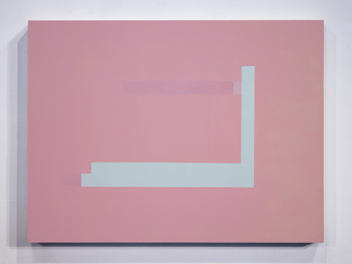 A pale blue geometric form resembling an abstract architectural structure or staircase is centered against a soft pink background on a cradled panel. The composition features clean lines and a minimalist aesthetic, with subtle shadows cast along the left edge suggesting dimensional depth.