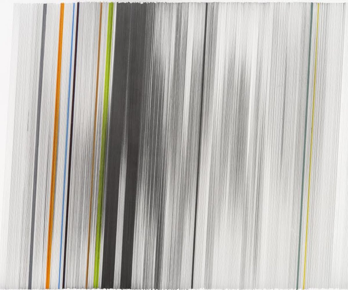Densely layered vertical lines in graphite and colored pencil create an abstract composition, with thin streaks of orange, blue, green, and yellow punctuating the predominantly gray and white palette across the surface of mat board.