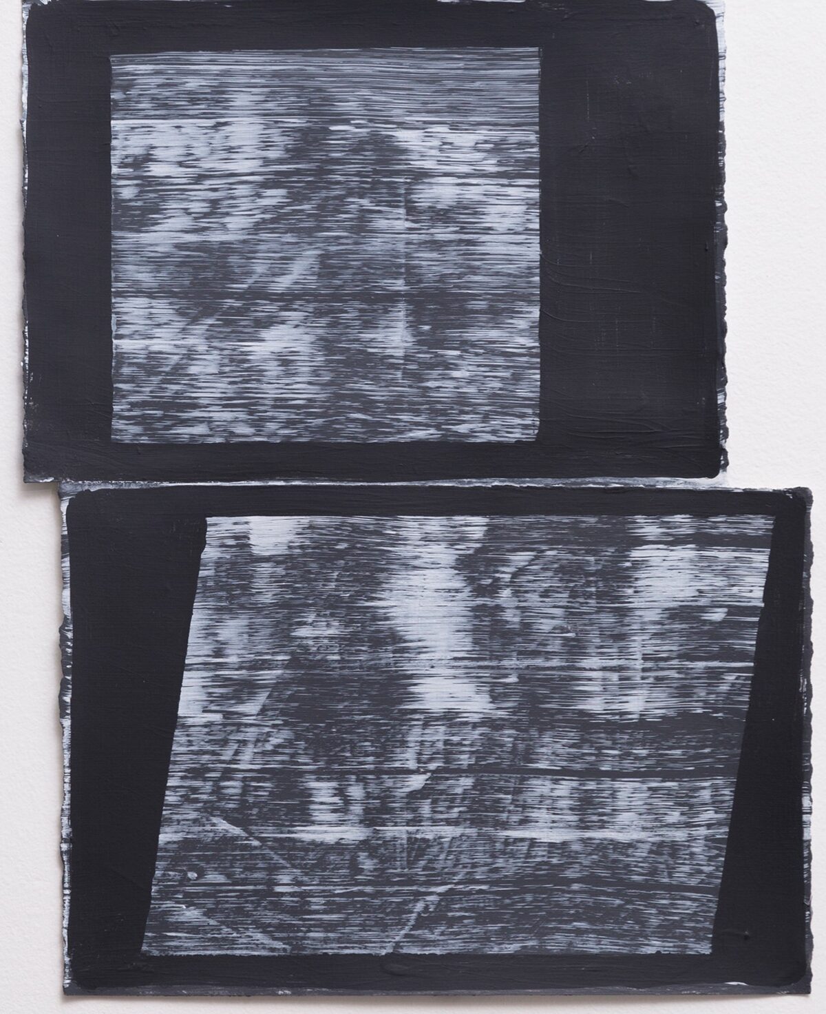 Two stacked rectangular panels with dark borders framing textured, horizontal striations in shades of gray and white, creating an abstracted, layered composition with a weathered or gestural surface quality.