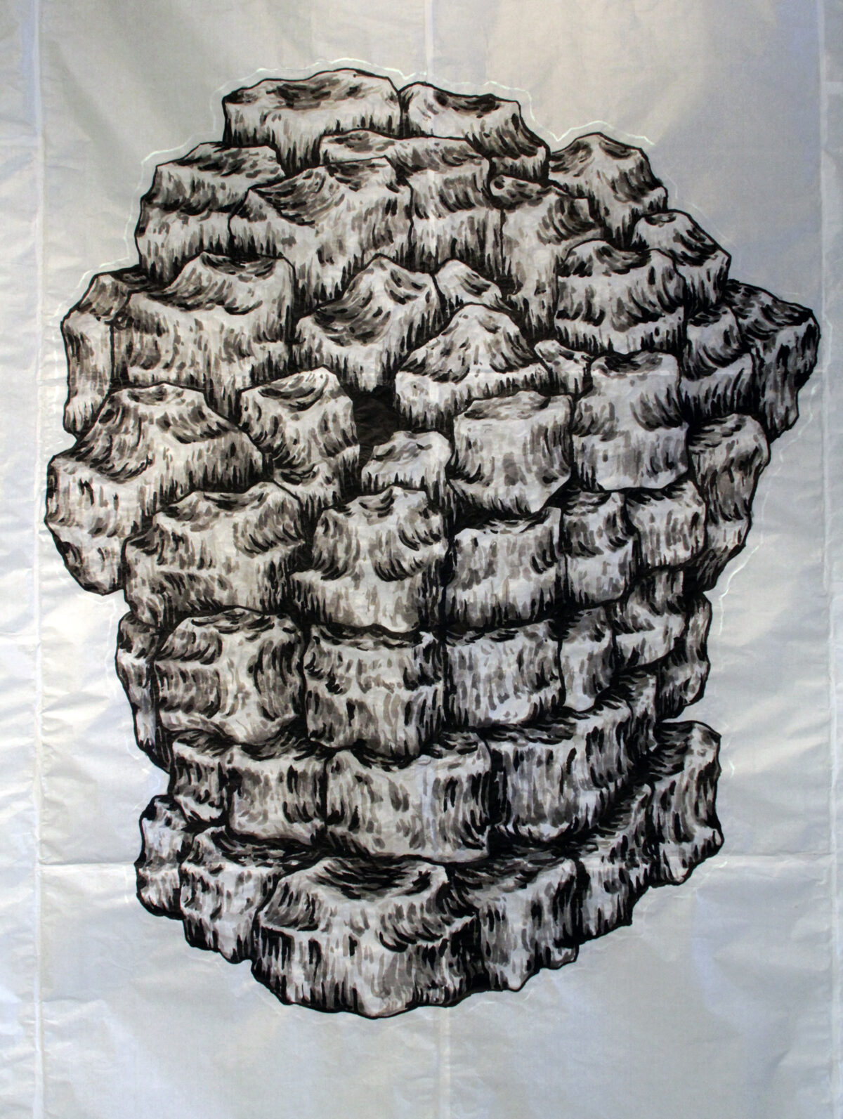 Monochromatic ink drawing on paper depicting an abstract, densely clustered form composed of overlapping rounded shapes with strong cross-hatching and linear marks creating shadow and texture throughout. The composition suggests an organic, geological, or skull-like structure viewed frontally against a neutral background.