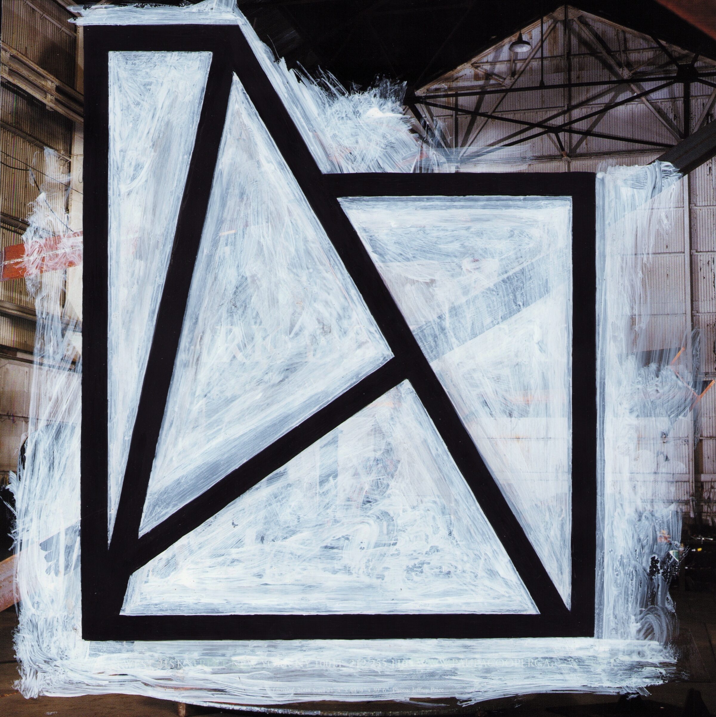 Abstract composition featuring bold black lines forming geometric shapes against a white textured background, with visible layered surfaces and industrial architecture visible at the edges of the frame.