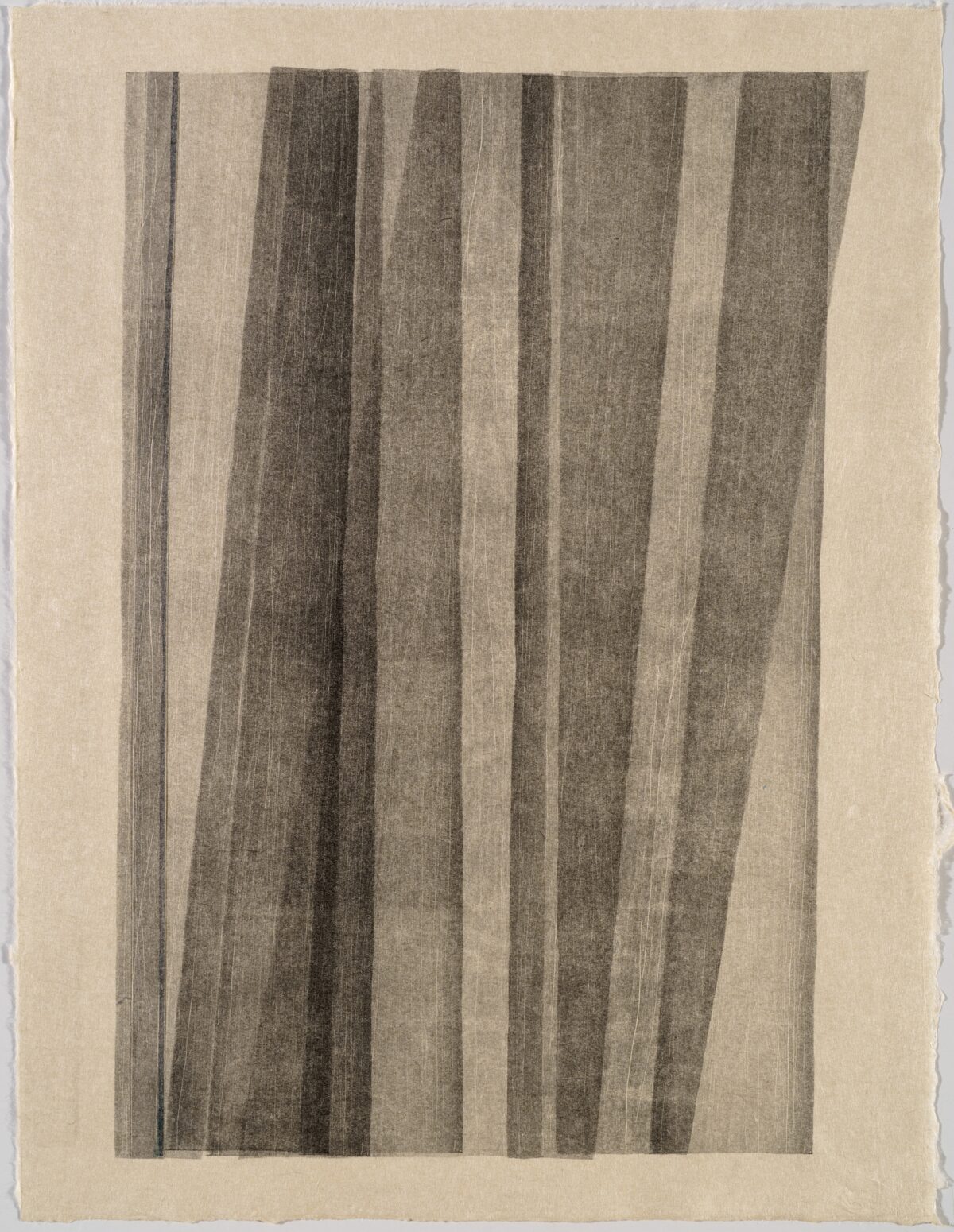 Vertical composition of alternating dark and light gray stripes of varying widths, creating a subtle undulating effect across the cream-colored paper surface. The parallel lines suggest movement and depth through gradual tonal shifts from charcoal to pale gray.