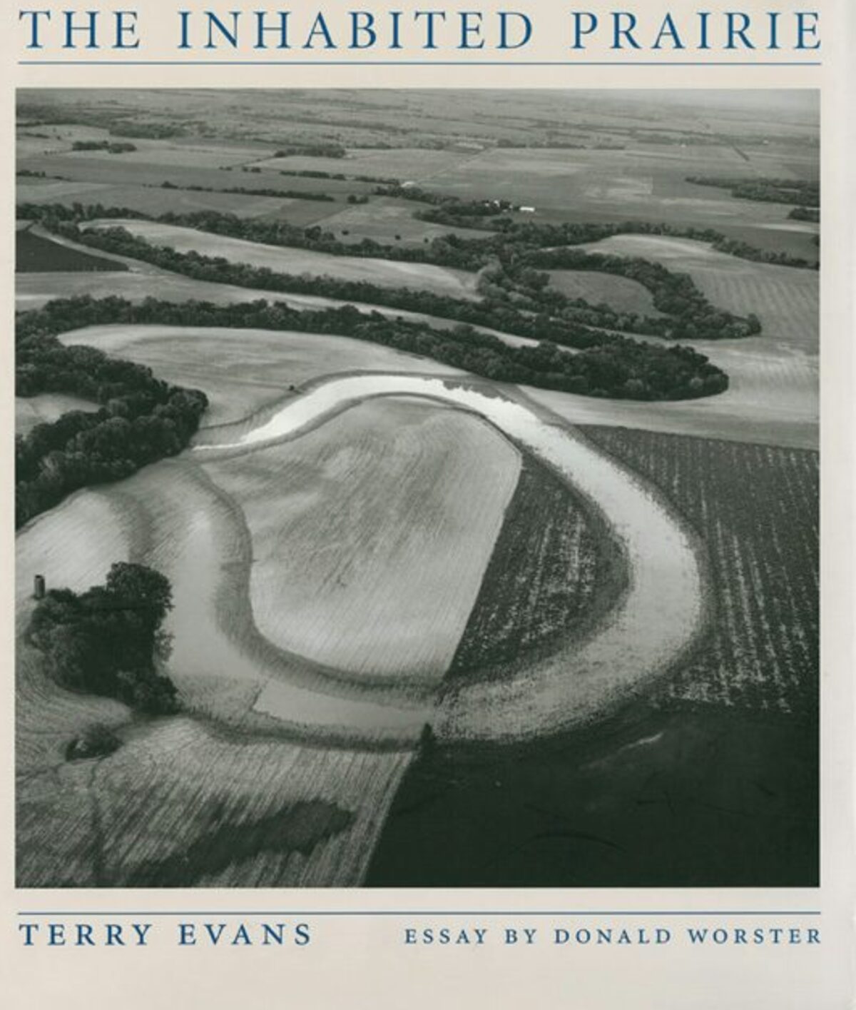 Front cover of The Inhabited Prairie by Terry Evans.