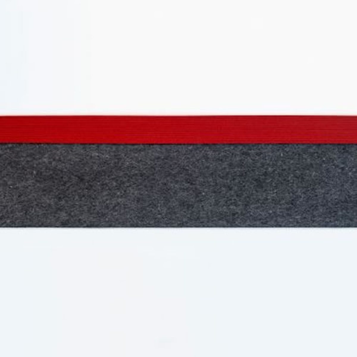 Horizontal composition featuring three bands of color: white at top and bottom framing a red stripe above a textured dark gray or charcoal band, creating a minimalist abstract arrangement with a tactile, felted material quality.