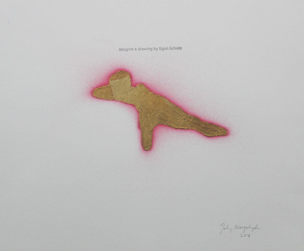 A gold leaf figure in a contorted, horizontal pose with outstretched limbs is surrounded by a vibrant pink halo that radiates across white paper, creating a luminous effect around the metallic form.