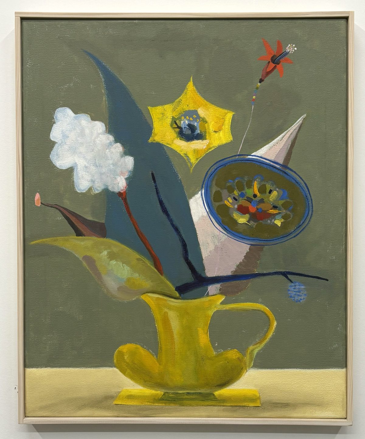 A surreal still life painting featuring a bright yellow pitcher as the central vessel, from which emerge various imaginative elements: a white fluffy form, dark blue curved shapes, a yellow star containing small figures, a blue-rimmed bowl with colorful objects, a red rocket, and other abstract forms against a muted green background.