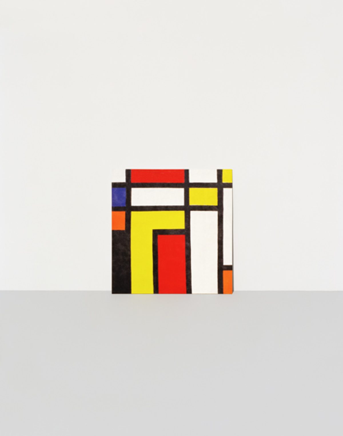 Abstract geometric composition featuring intersecting rectangular forms in red, yellow, blue, orange, and white, arranged against a neutral background in the style of modernist painting.