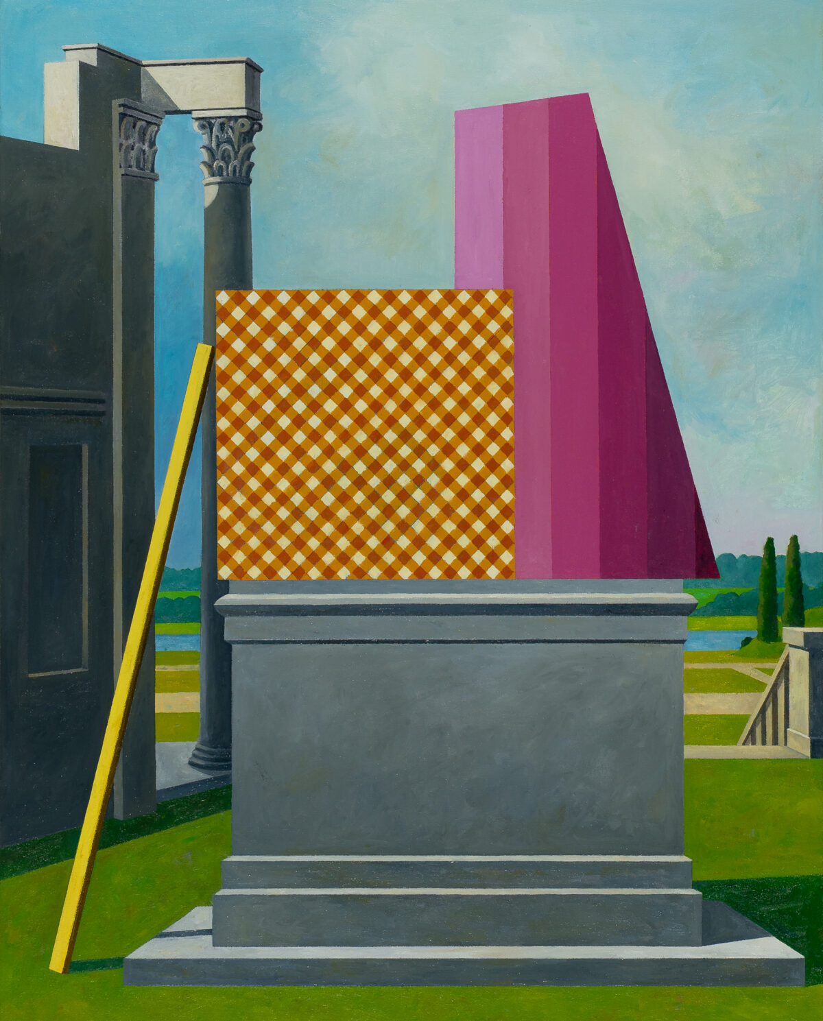 A surreal architectural composition featuring classical Corinthian columns on the left supporting a stone entablature, adjacent to a geometric abstract structure with a bold orange and white diamond pattern panel and a magenta trapezoid form. A yellow beam leans diagonally across the scene. The arrangement sits on a gray stone plinth in a manicured green landscape under a pale blue sky with distant cypress trees and a water feature visible along the horizon.