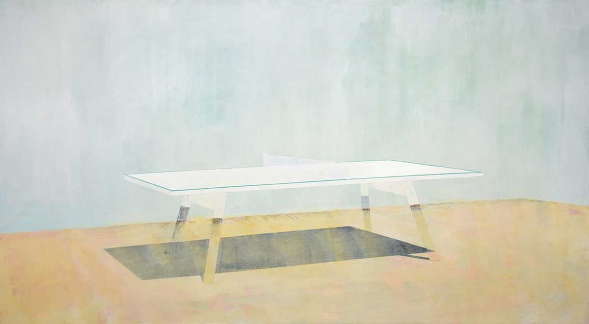 A minimalist painting depicting a rectangular glass or transparent table suspended above sandy ground, with yellow-painted wooden legs. The composition features a pale blue-gray sky above and warm beige tones below, creating a stark, dreamlike landscape with subtle gradations of color.