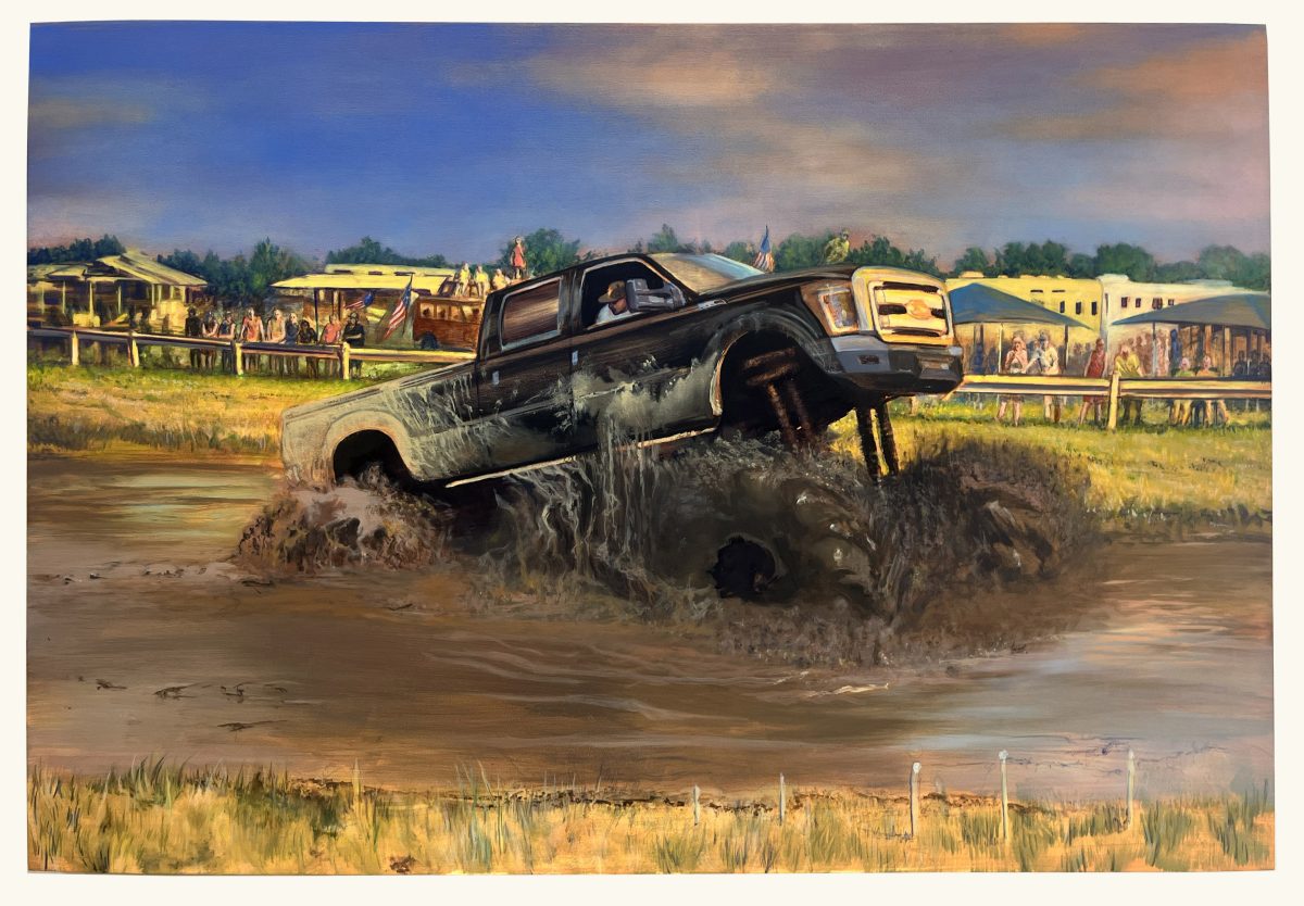 A dark pickup truck plunges through a muddy river, mud and water splashing dramatically around its wheels, while a driver peers from the cabin window. Behind the vehicle, a pastoral landscape unfolds with yellow buildings, wooden fences, grazing horses, and spectators gathered along the shoreline under a soft, hazy blue sky.