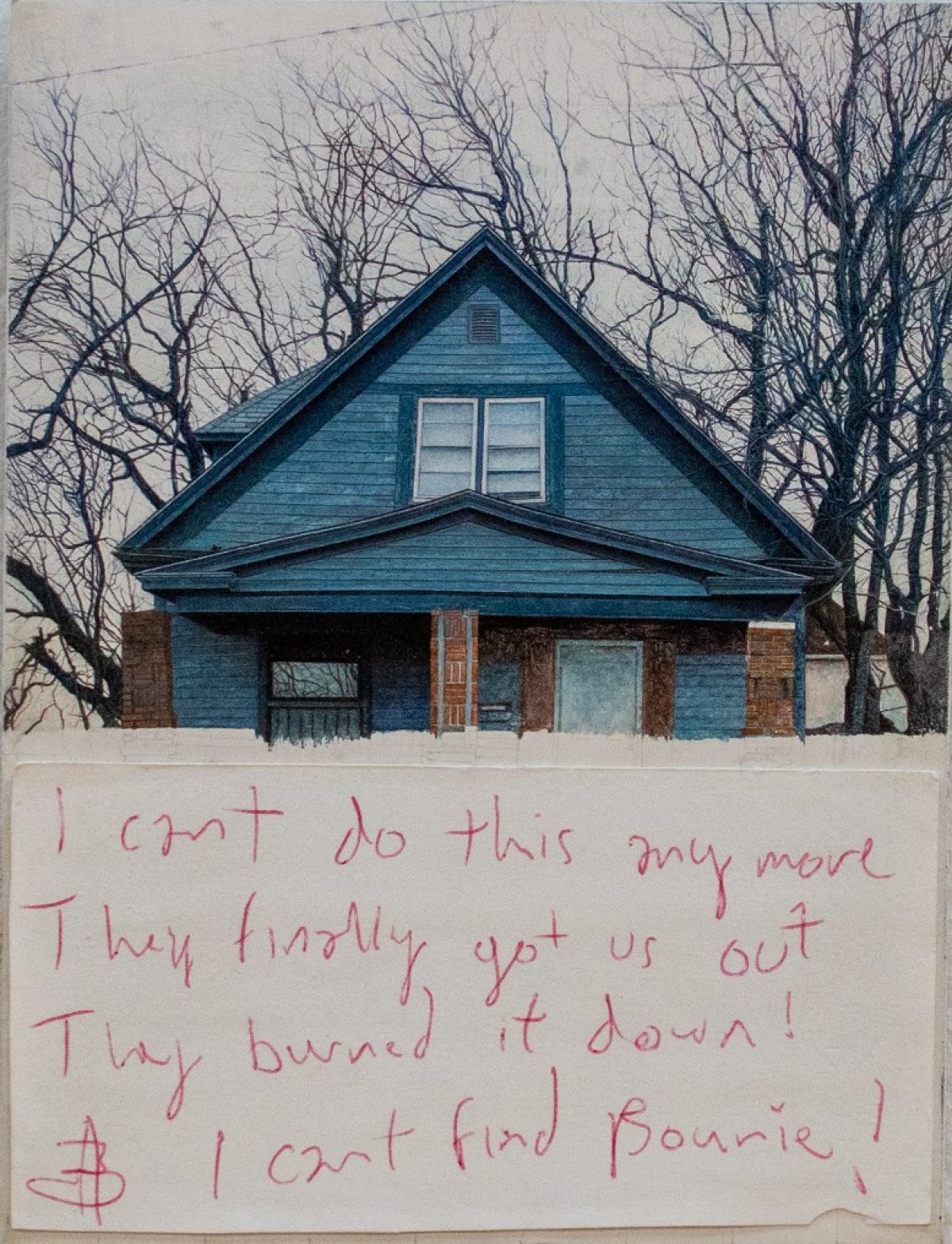 A blue house with bare trees stands in winter snow, its windows and brick foundation visible. Handwritten text in red ink covers the lower portion, expressing distress about a fire and a missing person named Bonnie.