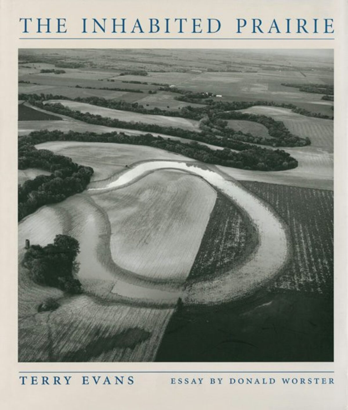 Front cover of The Inhabited Prairie by Terry Evans.