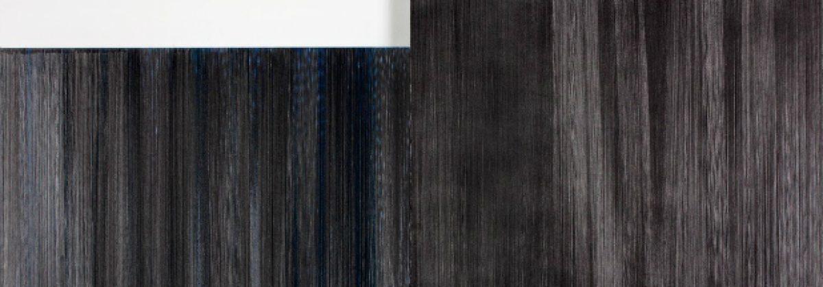 Vertical wooden planks in varying shades of dark gray and charcoal, arranged in parallel lines with subtle tonal gradations creating a minimalist, abstract composition.