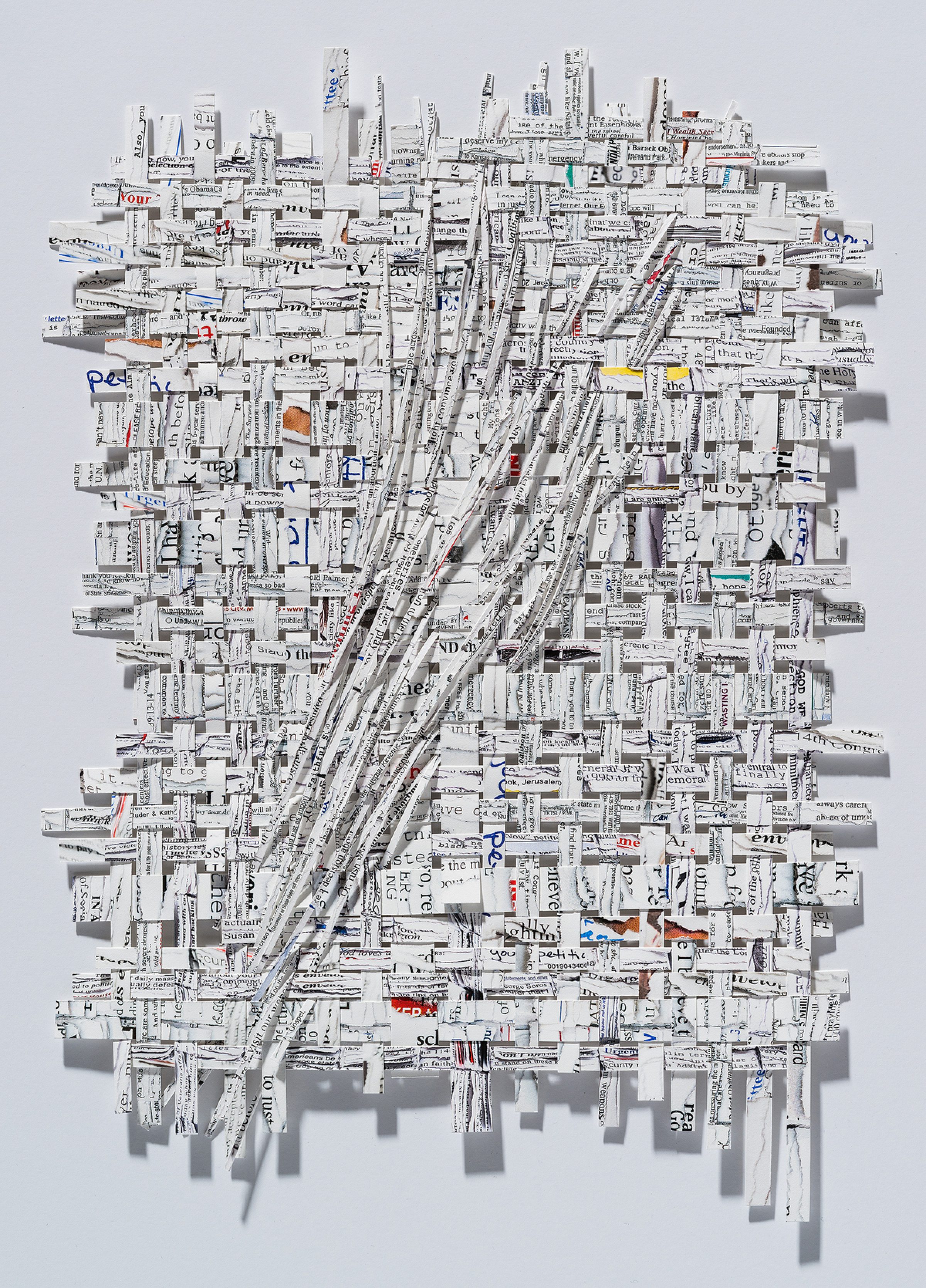 A three-dimensional collage of shredded and layered printed text and newspaper fragments arranged on a white wall, creating a dense, textured composition with diagonal striations and scattered edges. Occasional pops of color—including yellow, orange, red, and blue accents—punctuate the predominantly white and gray tones.