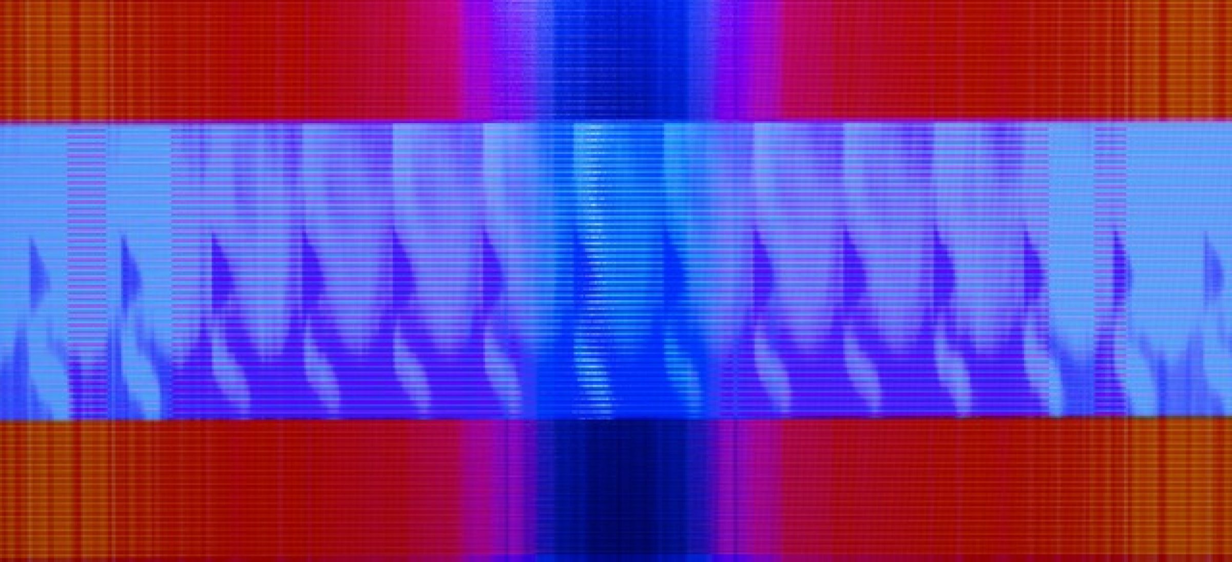 Horizontal composition with vibrant gradient bands of red, orange, pink, magenta, and blue, featuring a central section of lighter blue with repeating vertical flame-like or wave patterns in darker blue. Fine horizontal scan lines run throughout, creating a digital or electronic visual quality.