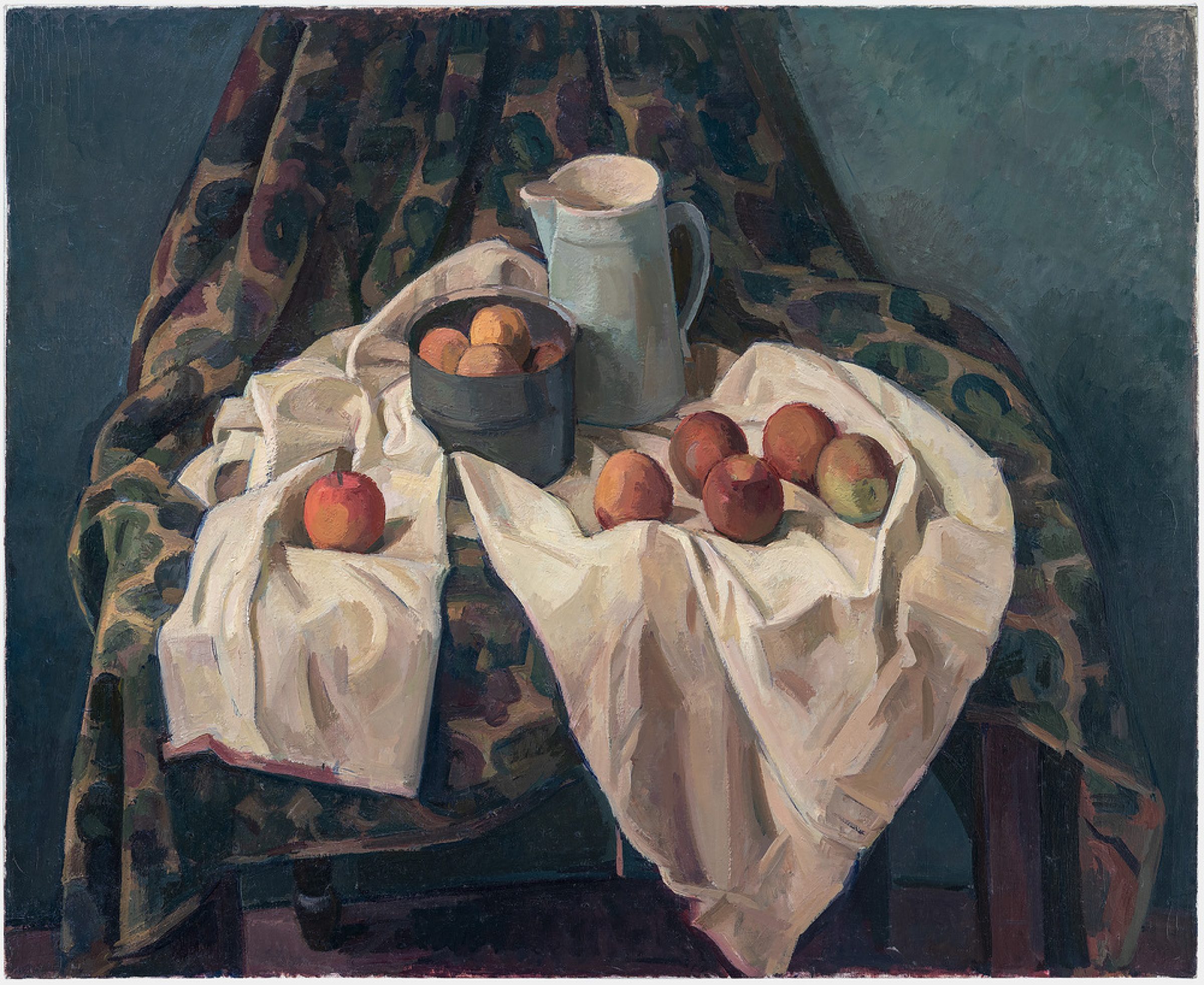 A still life composition featuring red and golden apples arranged on white draped fabric, with a dark bowl and gray ceramic pitcher set against a richly patterned dark textile backdrop. The painting employs warm earth tones and cool blues, with careful attention to the soft folds of the white cloth and the subtle modeling of the fruit.