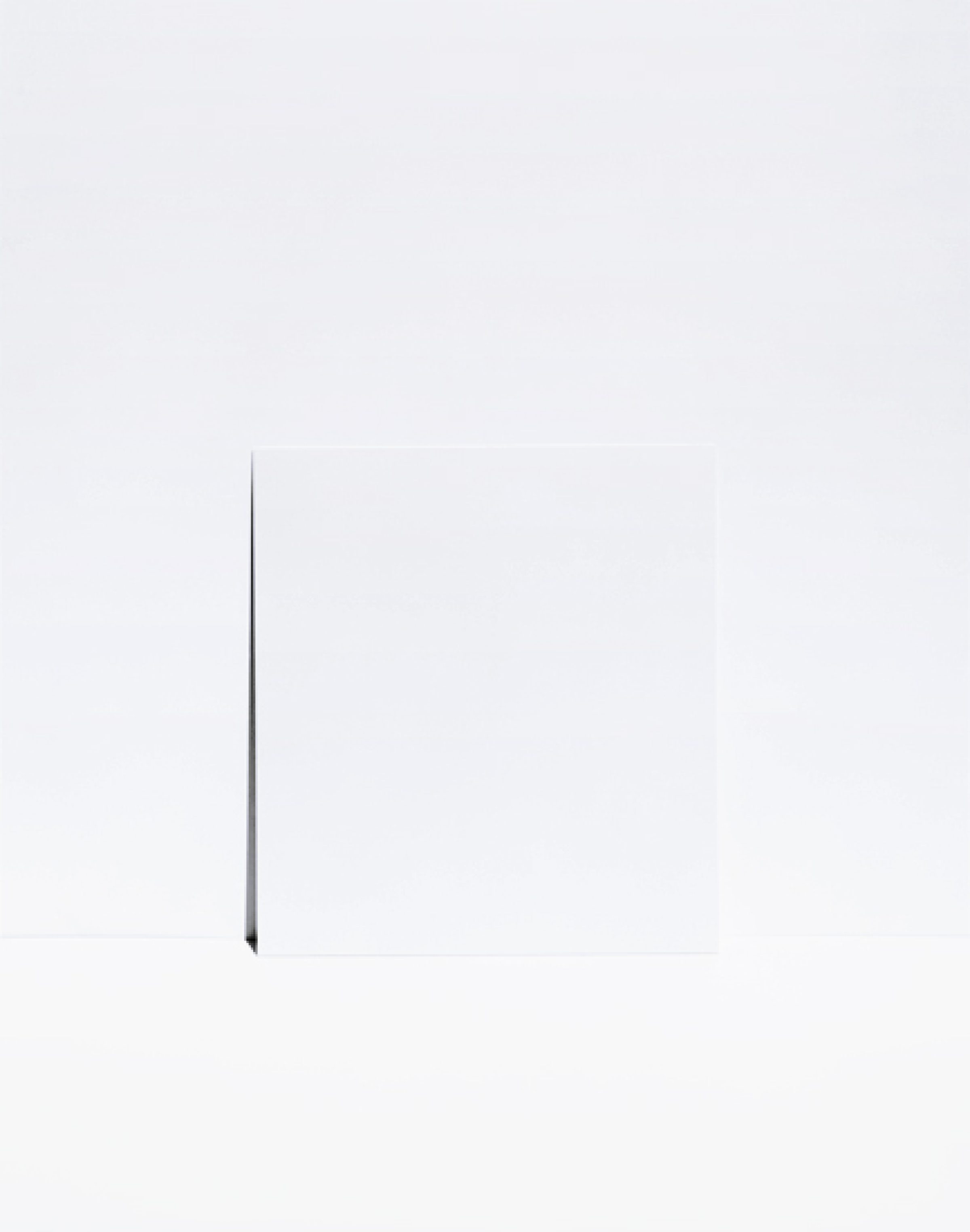 A minimalist composition featuring a single dark diagonal line extending from the lower left toward the upper center of a predominantly white field. The austere arrangement emphasizes negative space and subtle tonal variations across the pale background.