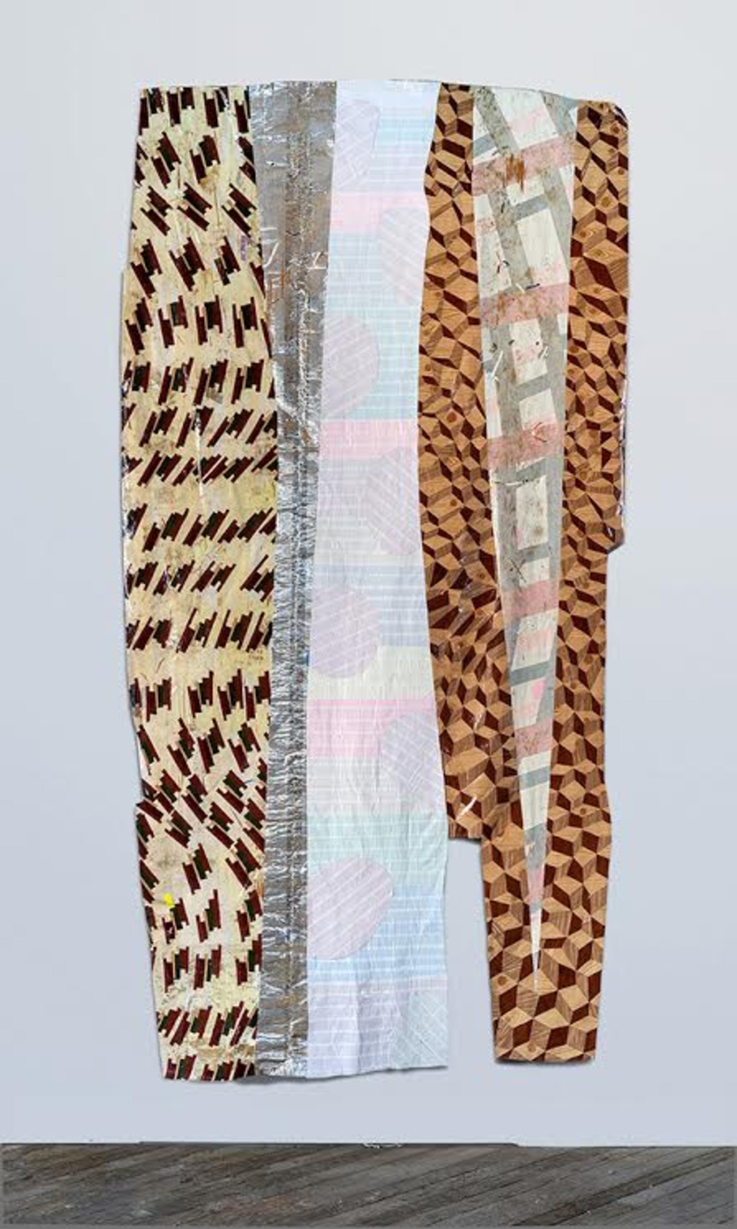 Vertical composition of layered fabric strips and tape in brown, cream, and white tones, featuring geometric patterns including diagonal lines and checkered designs, arranged in a draped formation against a white wall.