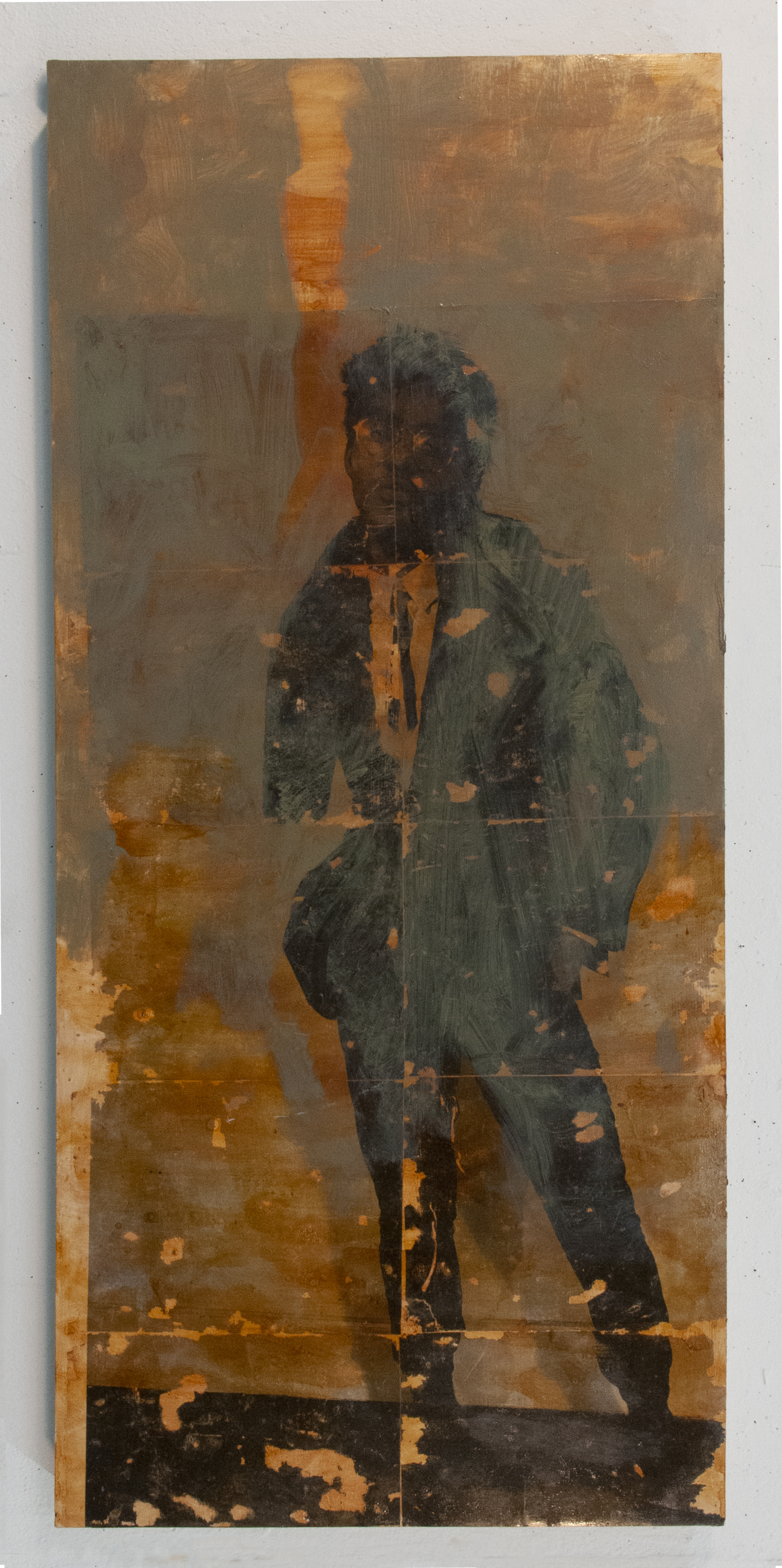 A standing figure in dark clothing is rendered in muted tones against a warm, weathered background of ochre and brown. The composition is vertical and austere, with visible paint layering and material deterioration across the surface, creating a sense of age and decay that contrasts with the central figure's defined form.