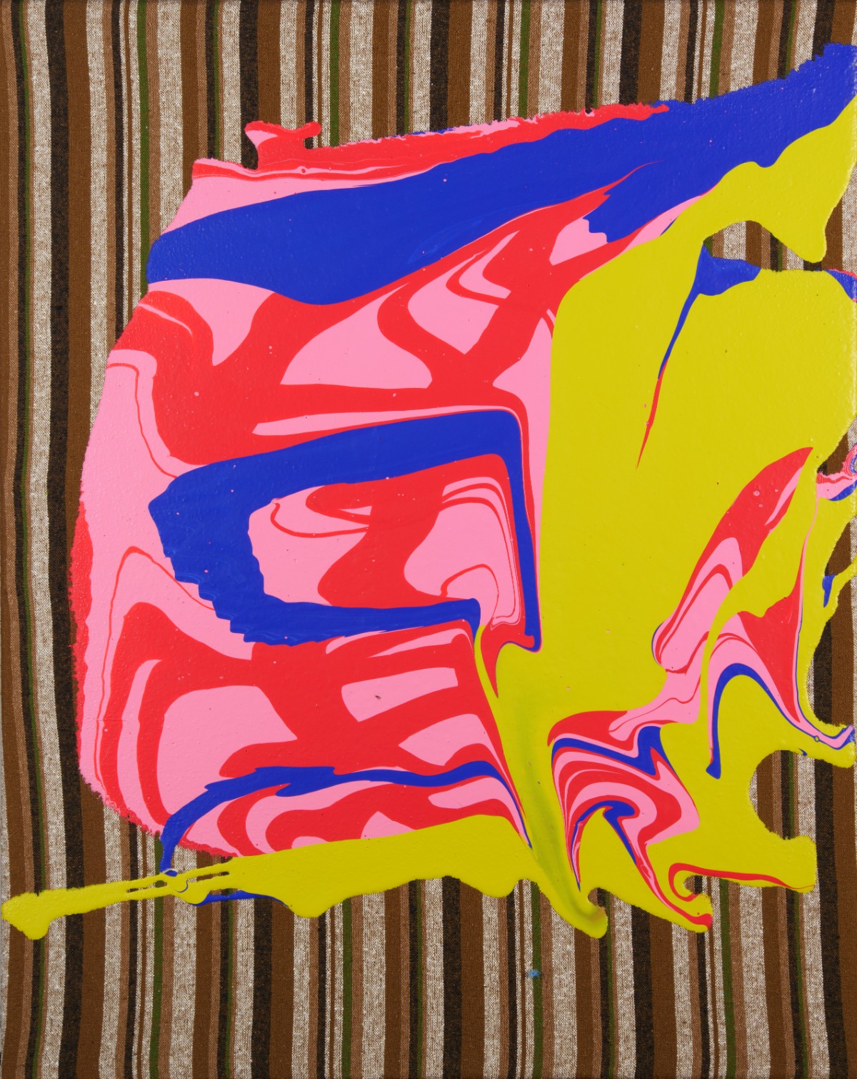 A vibrant, psychedelic map of the United States rendered in bold neon colors—bright yellow for the outer border, hot pink and red for interior regions, and electric blue for horizontal bands cutting across the form. The work displays a fluid, organic abstraction of geographical boundaries against a striped neutral fabric background.