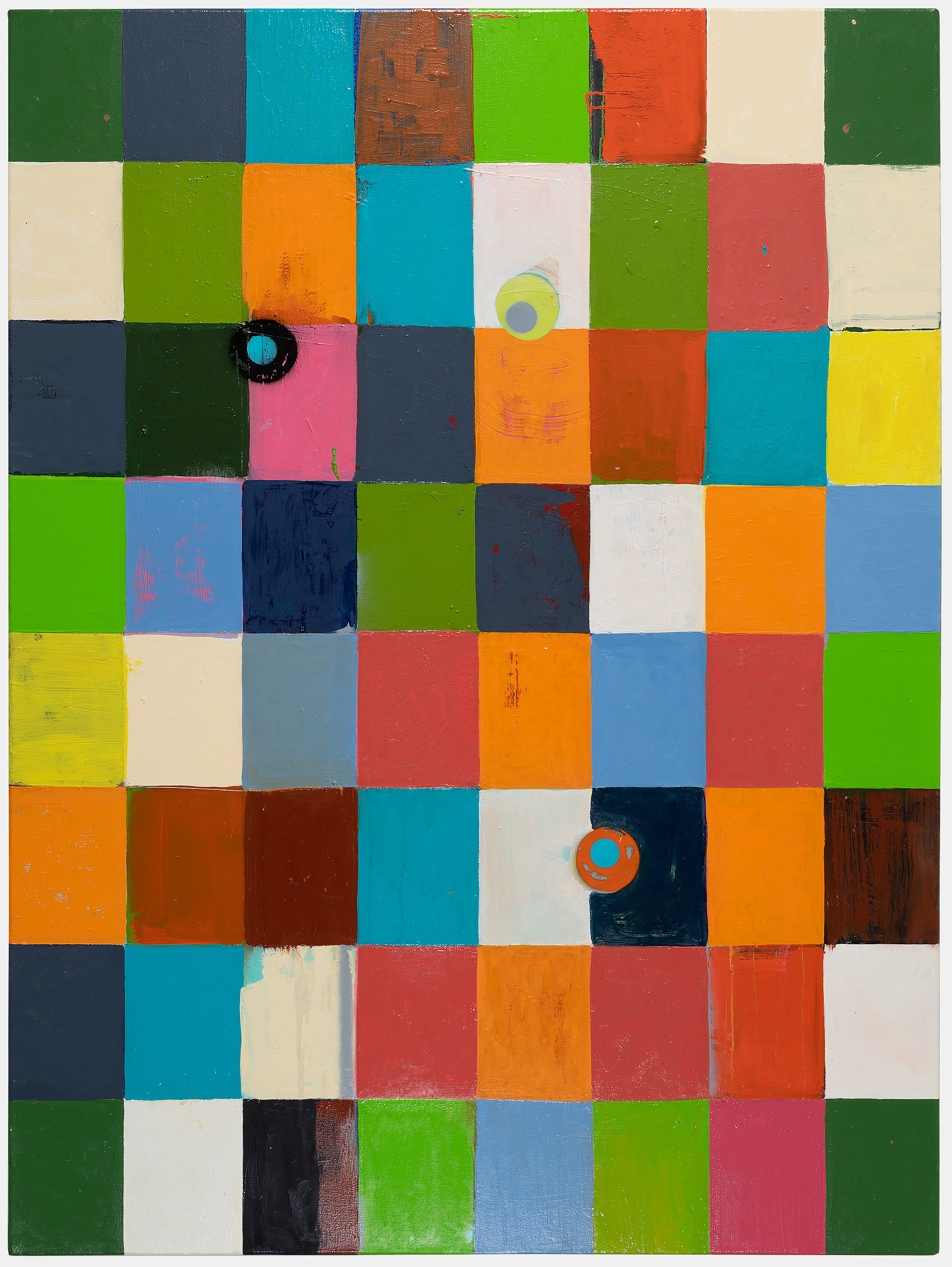 A grid of colorful painted squares in varying sizes fills the canvas, featuring vibrant hues of green, blue, orange, red, yellow, and cream. Two circular forms—one yellow-gray and one orange—are embedded within the composition, adding dimensional accents to the otherwise flat, geometric arrangement.