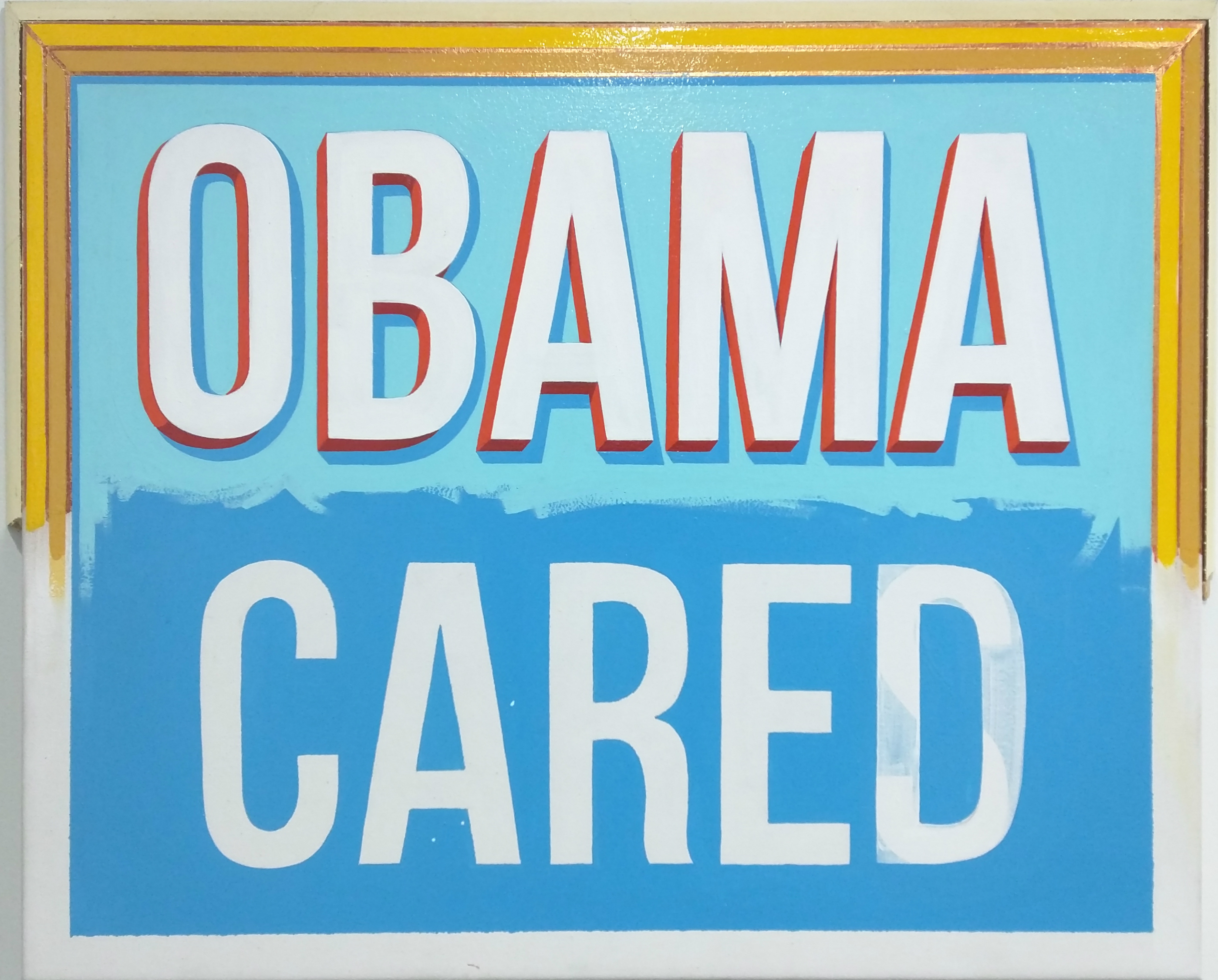Large-scale text artwork with "OBAMA" in red and white letters against a light blue background, and "CARED" in white letters on a darker blue section below, all contained within a bright yellow-gold frame.
