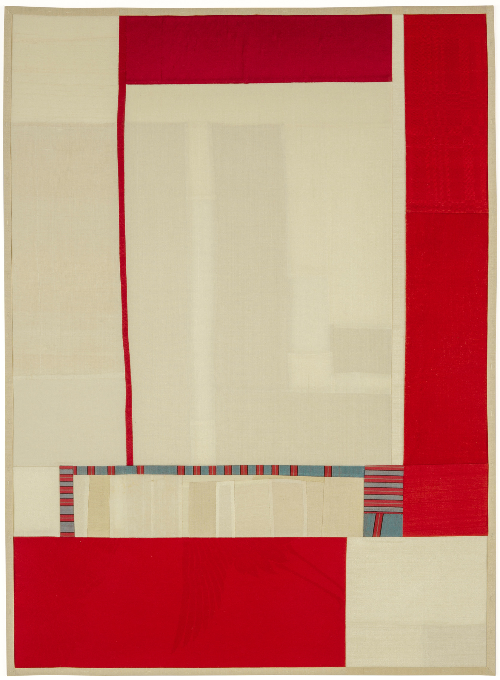 Abstract composition of pieced vintage silk in cream and red tones, featuring bold geometric rectangular forms arranged asymmetrically around a central cream panel. A horizontal band of striped patterning in red, gray, and blue runs across the middle, creating visual rhythm within the minimalist layout.