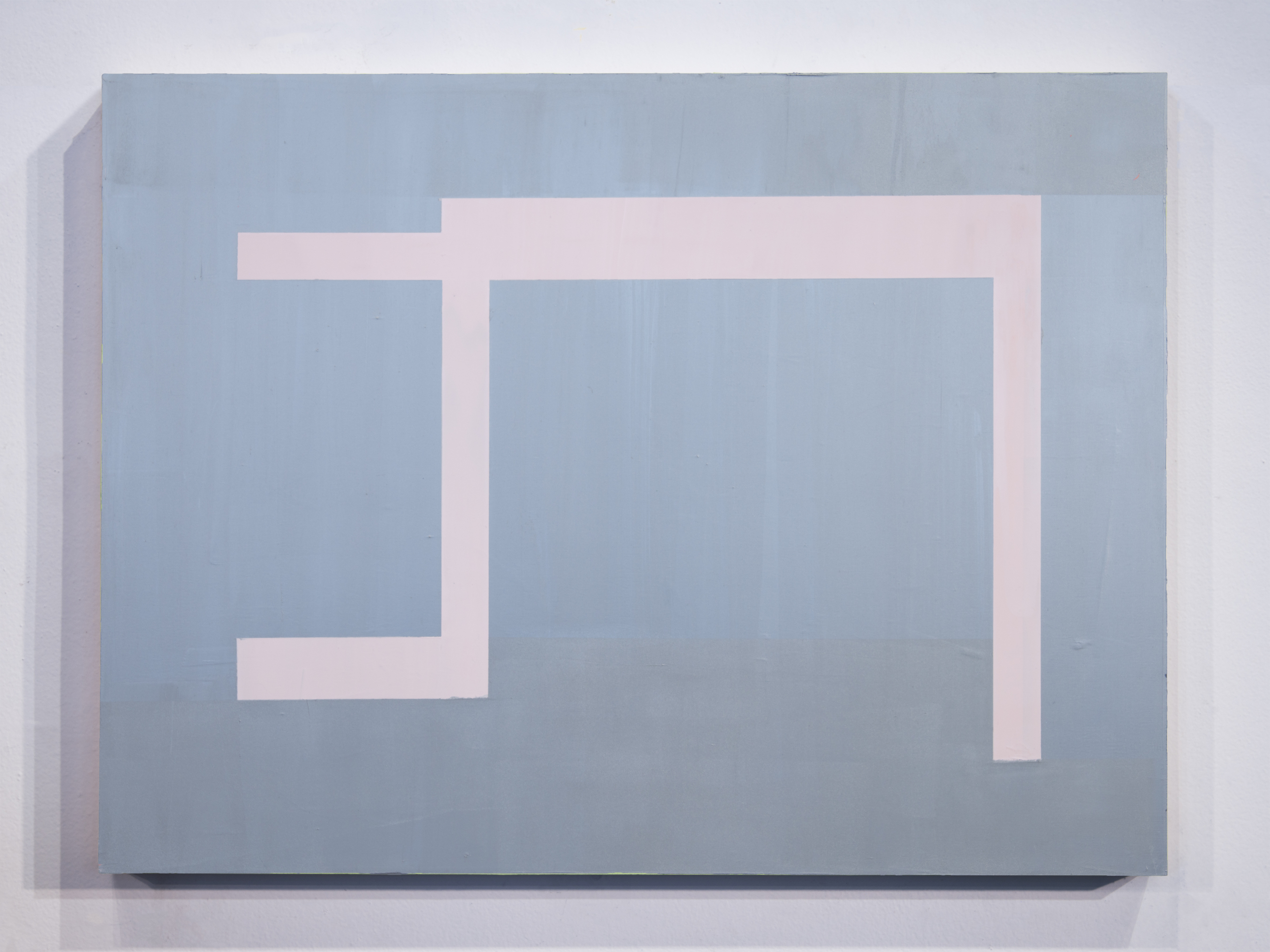 Abstract geometric composition featuring a pale pink angular frame or pathway against a muted blue-gray ground. The interlocking rectangular forms create a maze-like pattern with clean edges and a subtle dimensional quality enhanced by the painting's textured surface.