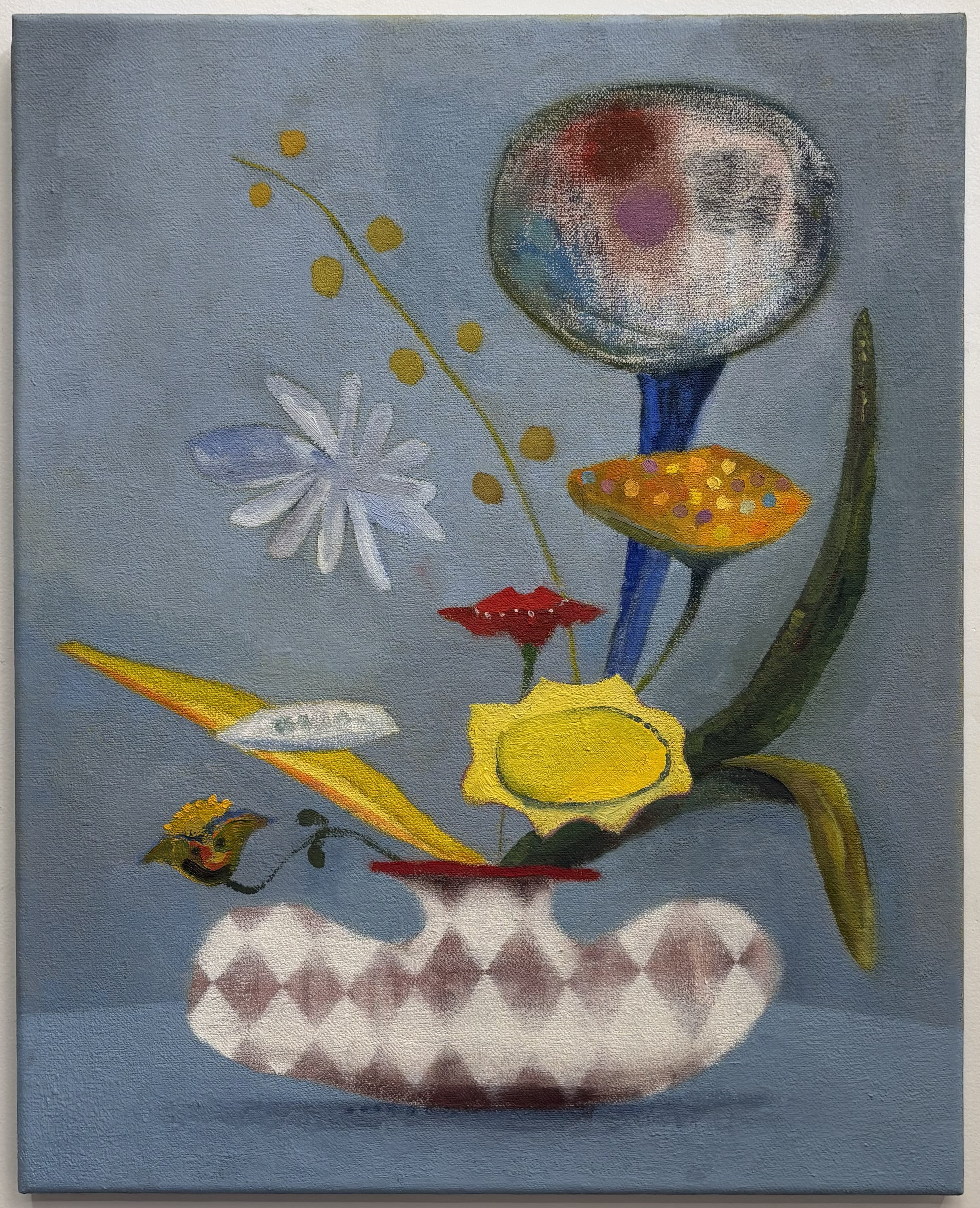 A surreal oil painting featuring an imaginative plant-like form with a large circular head containing colorful abstract markings, set against a muted blue-gray background. The composition includes stylized flowers and botanical elements in yellow, red, white, and green, rooted in a white textured vessel, creating a whimsical and dreamlike arrangement.