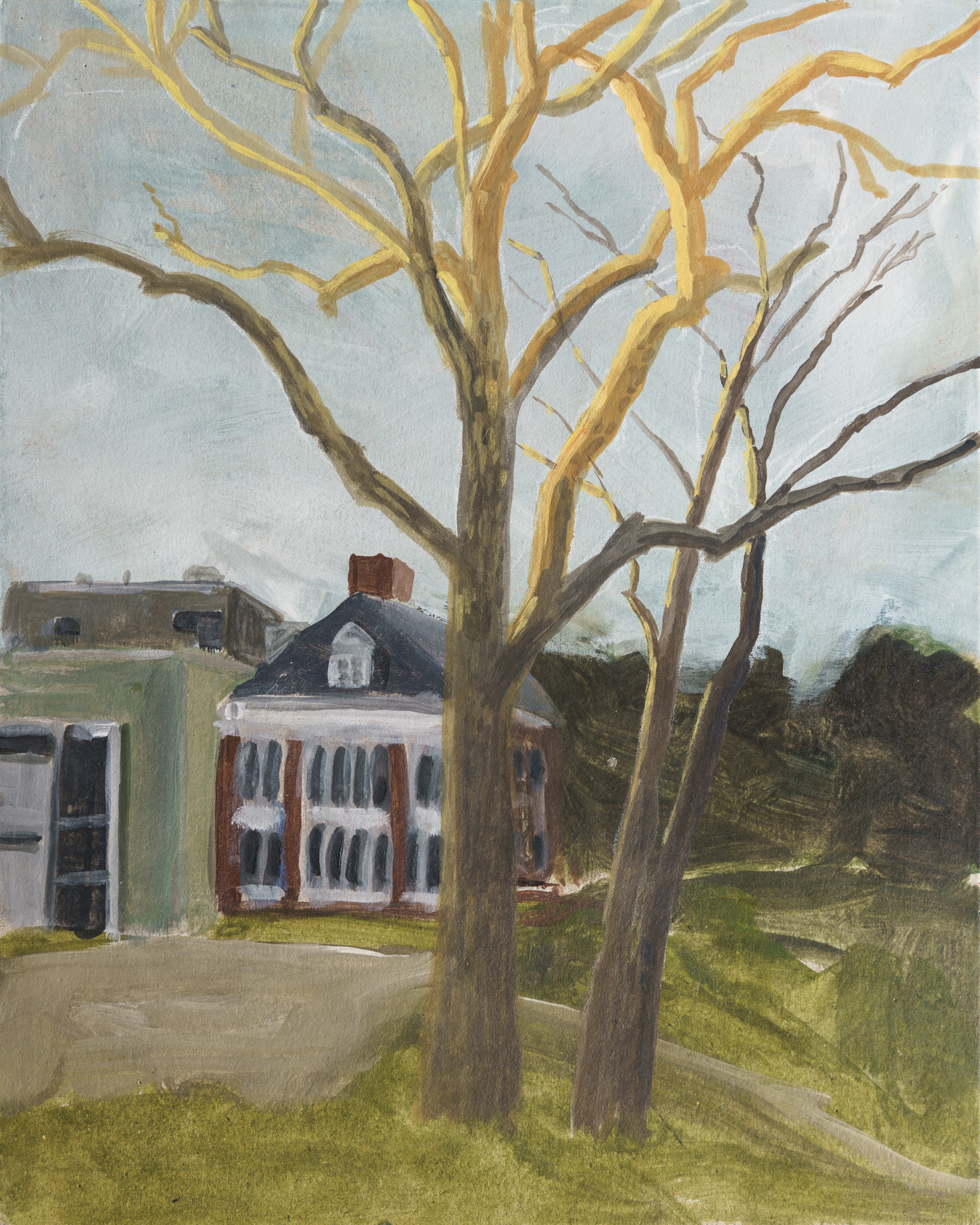 A rural landscape painting depicts bare-branched trees in the foreground with golden and brown tones, framing a view of colonial-era buildings including a brick house with white trim and a dark roof. The composition shows a grassy yard and distant fields under a pale blue sky, rendered in warm earth tones and muted greens characteristic of tempera and wax painting.
