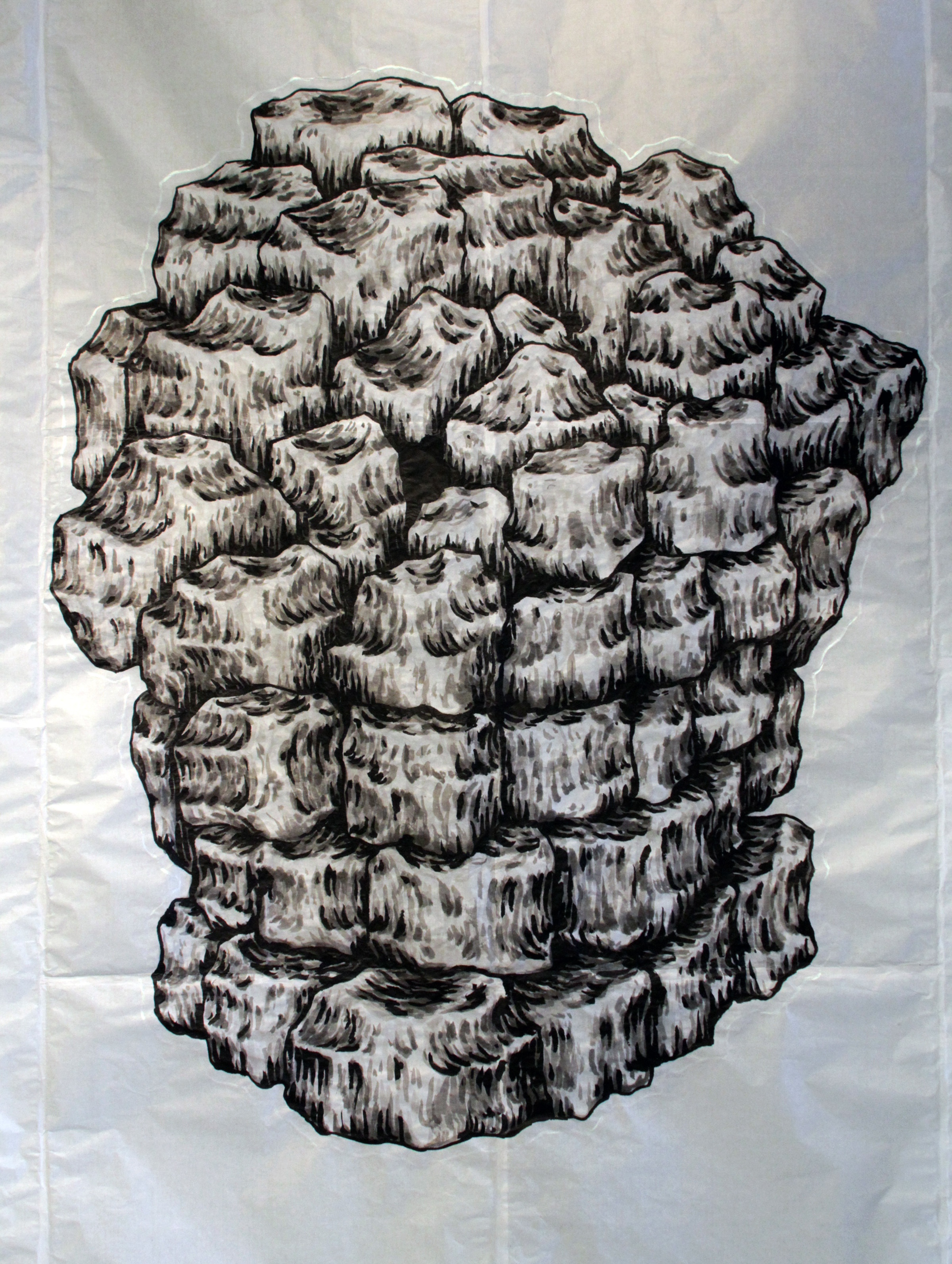 Monochromatic ink drawing on paper depicting an abstract, densely clustered form composed of overlapping rounded shapes with strong cross-hatching and linear marks creating shadow and texture throughout. The composition suggests an organic, geological, or skull-like structure viewed frontally against a neutral background.