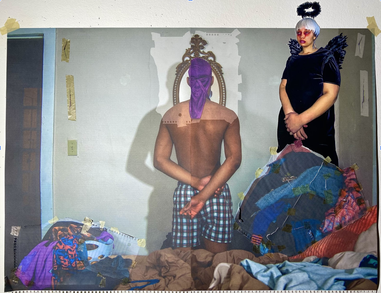 Two figures occupy a bedroom interior taped to white walls: a shirtless figure with a purple-wrapped head seated in an ornate frame, and a figure in black velvet with dark wings and silver hair standing nearby. Scattered clothing and fabrics in jewel tones cover the floor, creating a collaged composition of mixed printed and drawn materials.