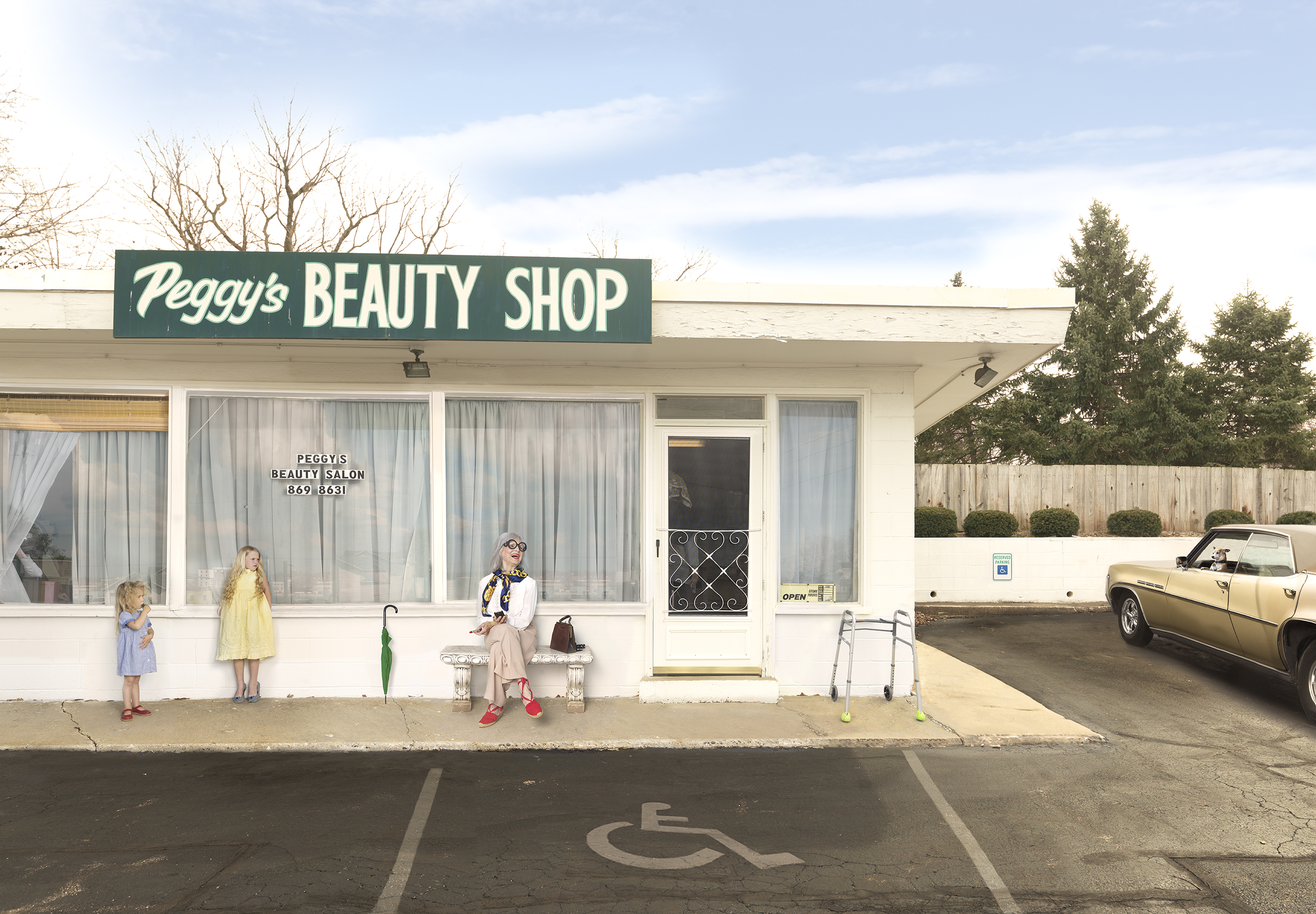 A vintage-styled storefront with a green sign reads "Peggy's Beauty Shop," featuring large display windows with white curtains. Three figures in colorful dresses stand on the sidewalk in front, alongside period furnishings and a green umbrella, while a cream-colored convertible is parked nearby. The composition captures a nostalgic American roadside scene rendered in soft, saturated color tones.