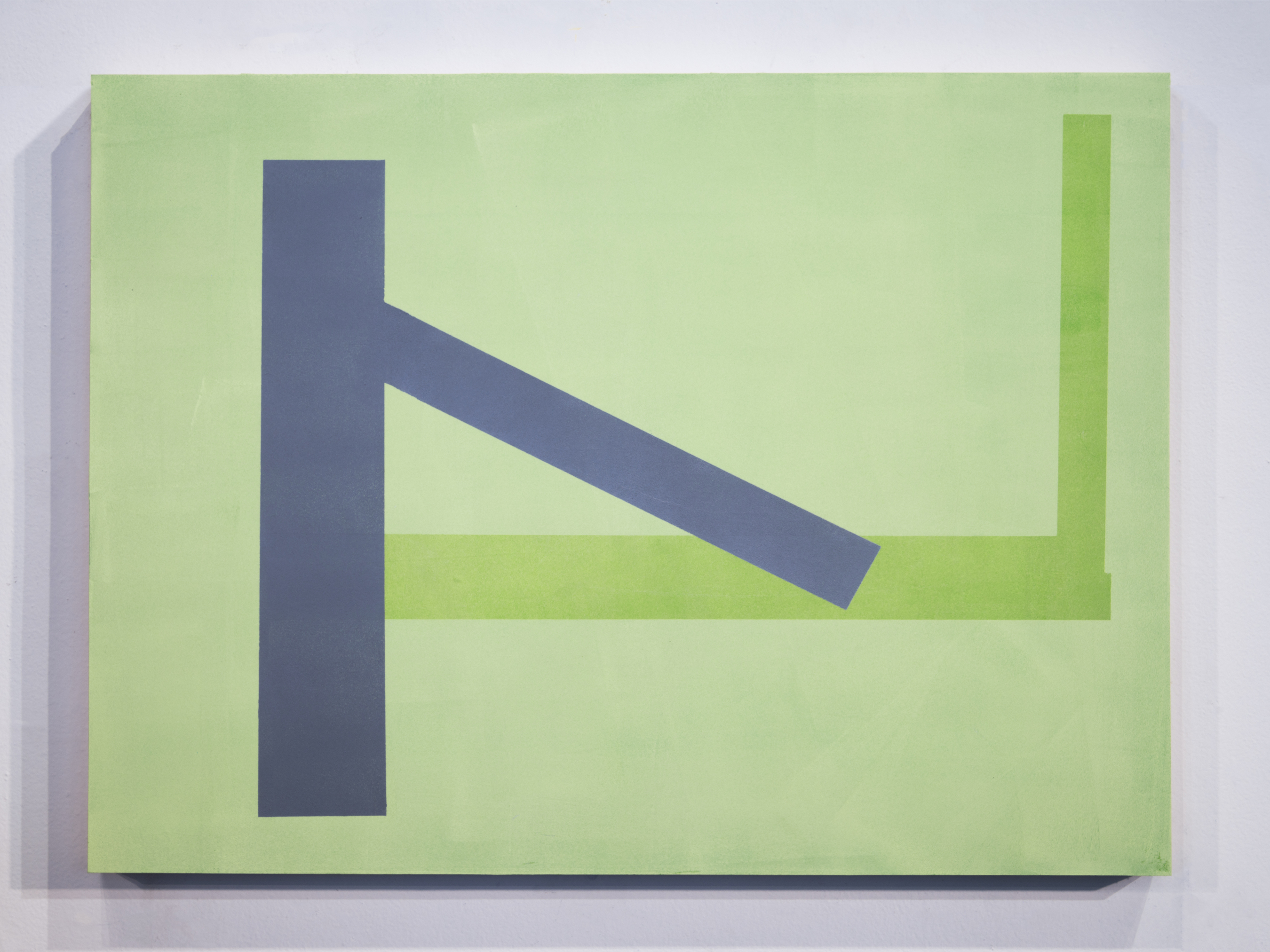 Geometric abstract composition on a light green panel featuring a dark blue vertical rectangle intersected by a diagonal beam, with a horizontal band of brighter green crossing through the lower portion of the work.