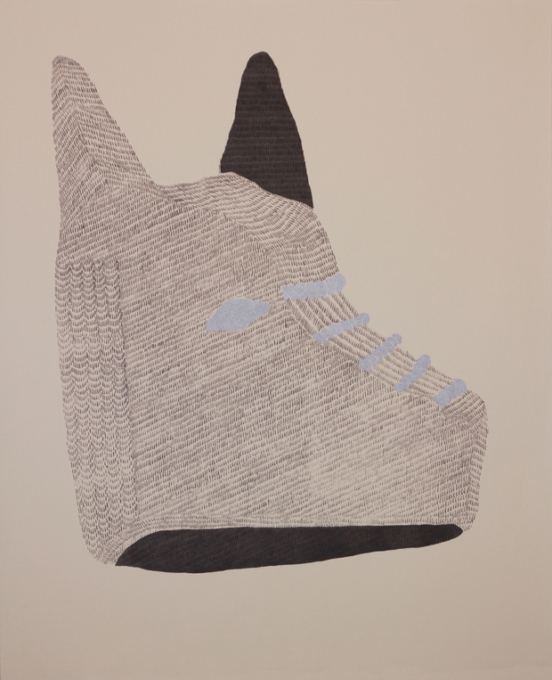 An abstract composition featuring a stylized helmet form rendered in layered graphite and silver ink with linear hatching patterns. Dark charcoal and lighter textured areas create dimensional contrast against a neutral beige background, with blue accents suggesting straps or structural elements.