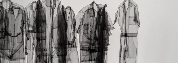 Five translucent fabric garments arranged in a row against a light background, their layered forms creating shadowy silhouettes and subtle variations in density and transparency throughout the composition.
